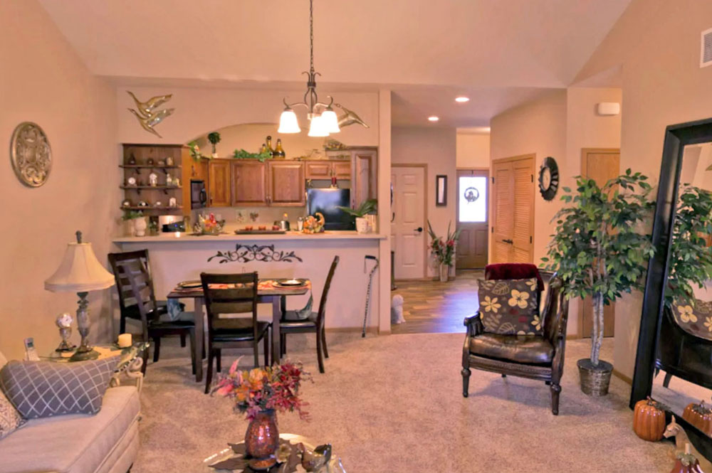 Townhome villa interior dining and kitchen at Primrose Retirement in Aberdeen, SD