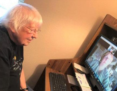 Senior woman using her computer