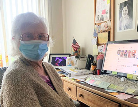 Senior woman using her computer