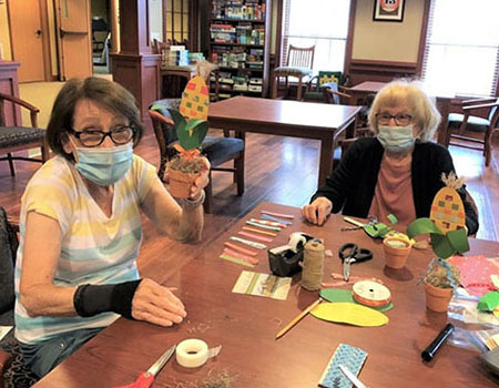 Senior woman doing crafts together