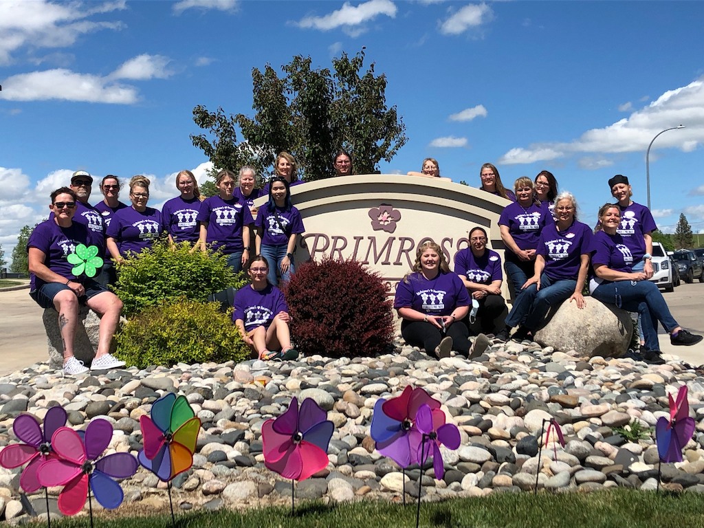 Primrose team wearing purple branded t-shirts in honor of the Longest Day Alzheimer's event.