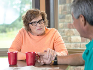 Senior couple having coffee together