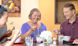 Seniors enjoying each other's company during mealtime